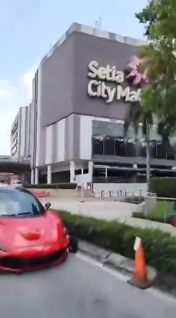 Red Ferrari Park Roadside Outside Setia City Mall Towed 2