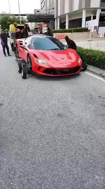 Red Ferrari Park Roadside Outside Setia City Mall Towed 3