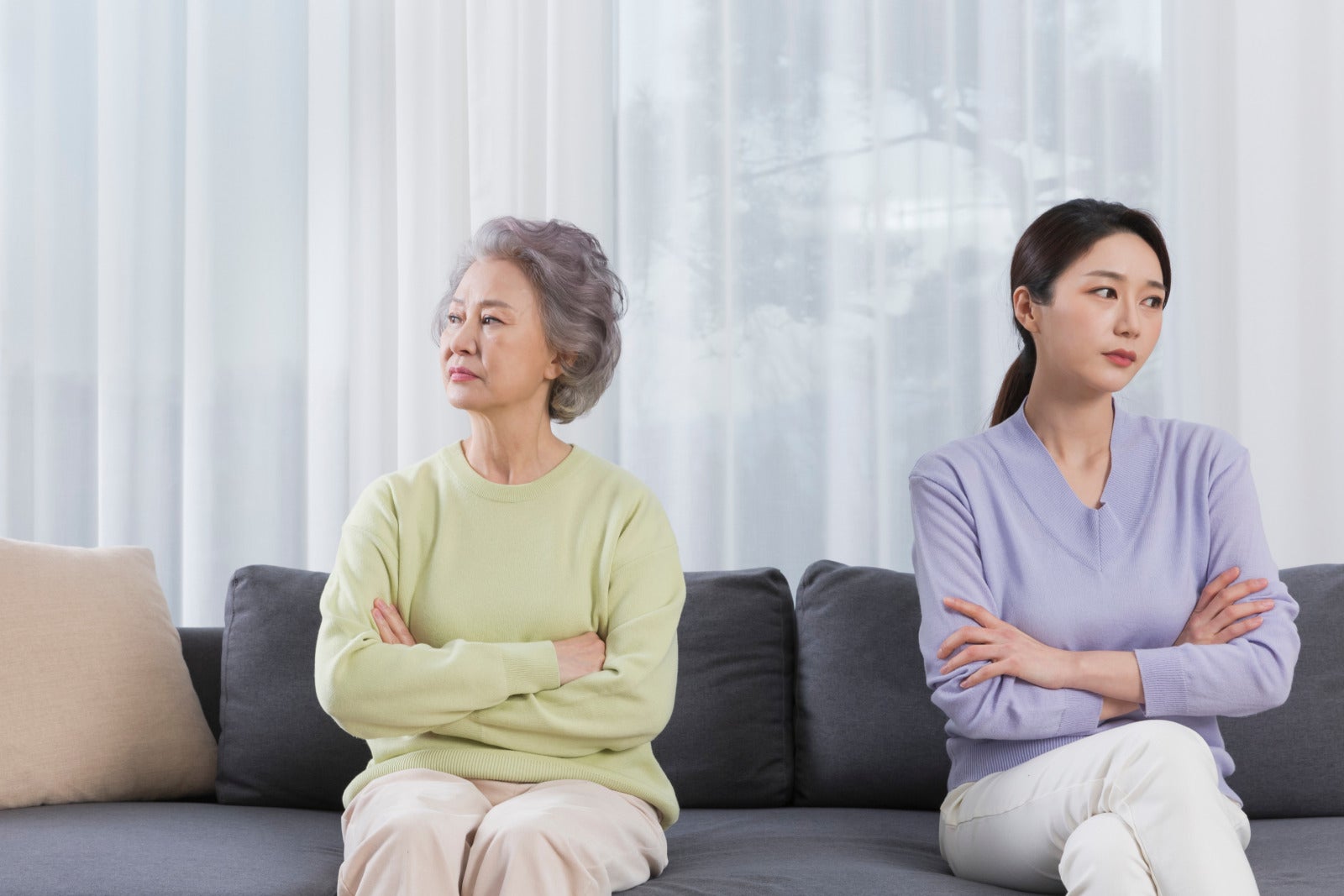 asian mum daughter in law unhappy argue sitting sofa home 123rf