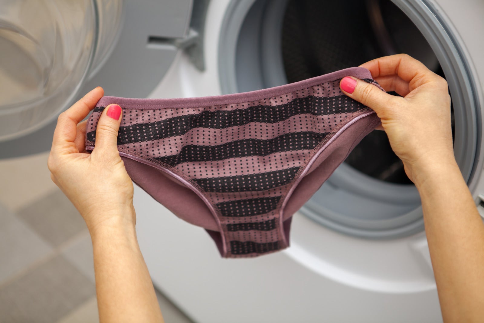 woman hand holding wash underwear panty washing machine 123rf