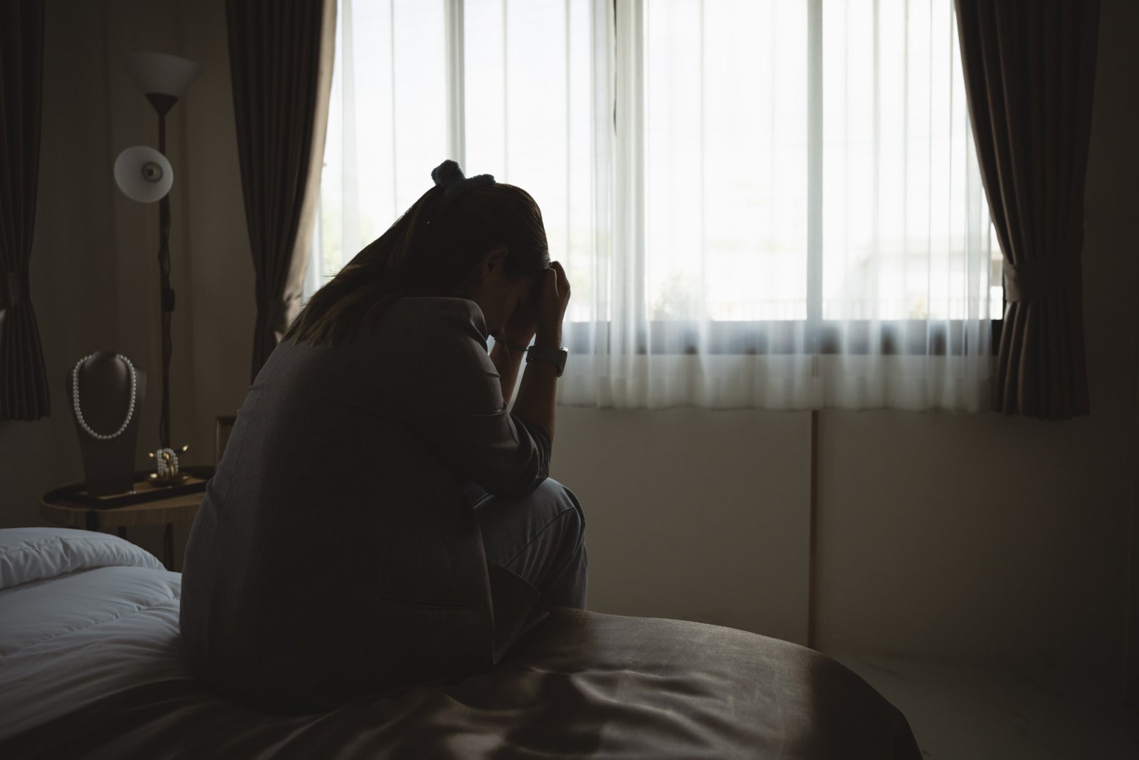 Depressed Woman Sitting On Bed Room Window Curtain 123Rf