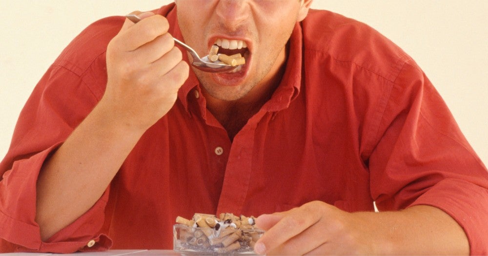 Man Eats Cigarette