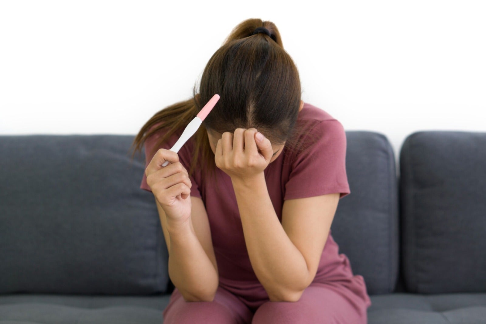 Asian Woman Holding Pregnancy Test Depressed Sad Stressed 123Rf