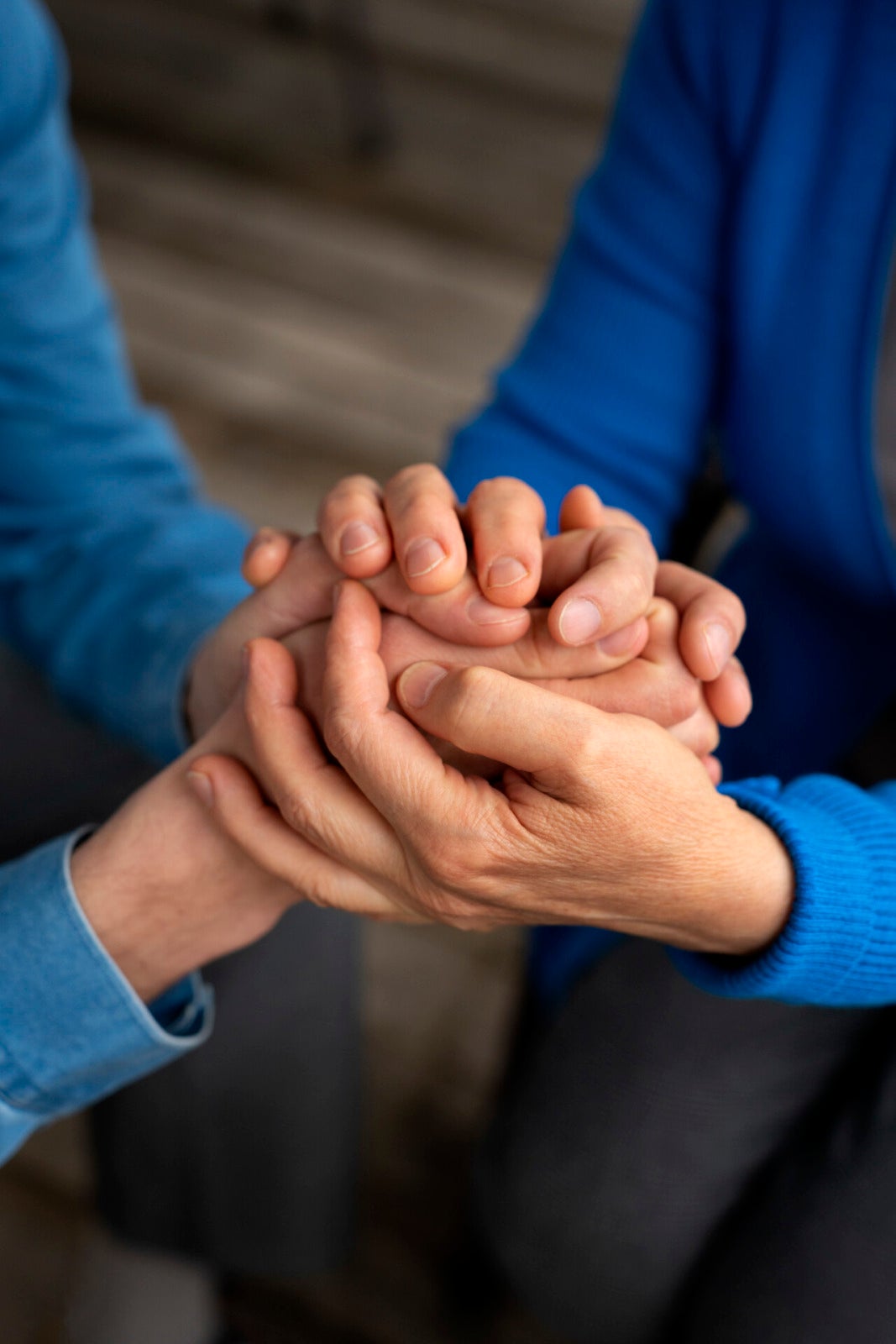 hands holding each other support