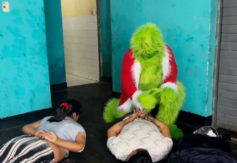 police in grinch costume cosplay raid criminal