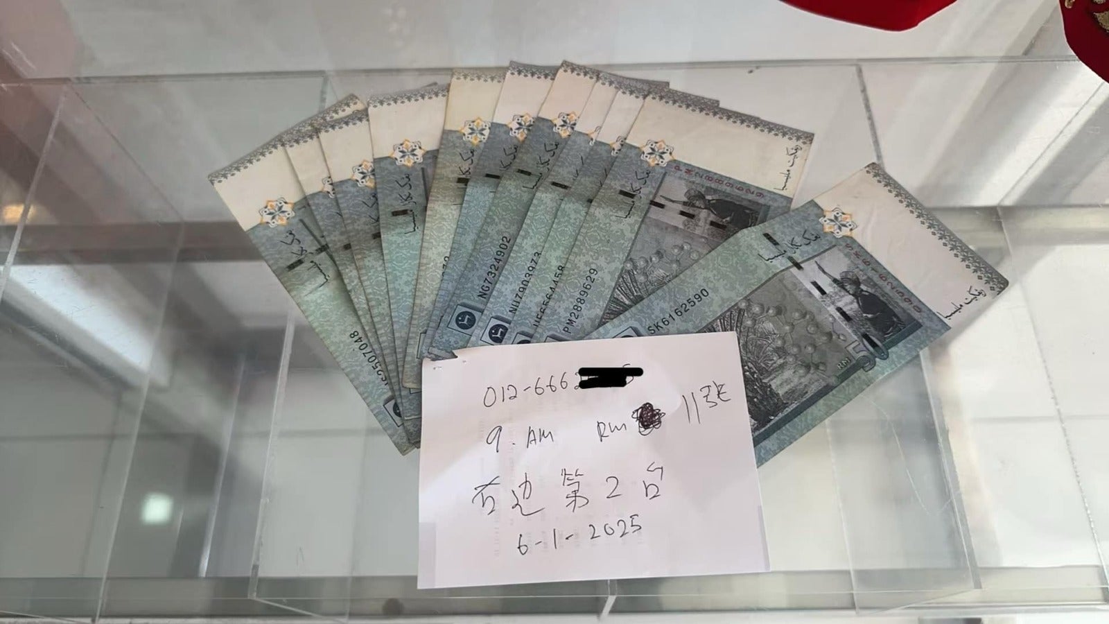 left rm50 banknotes cash atm looking for owner scaled