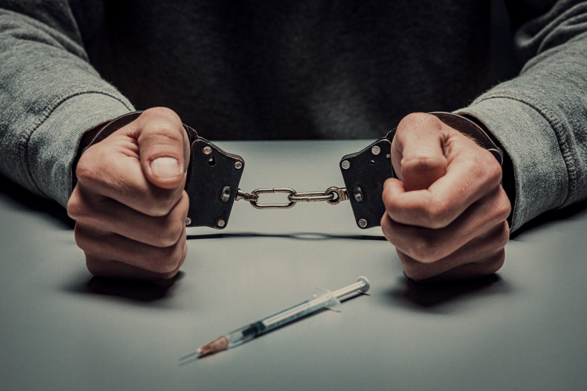 man hands arrested hancuffs 123rf