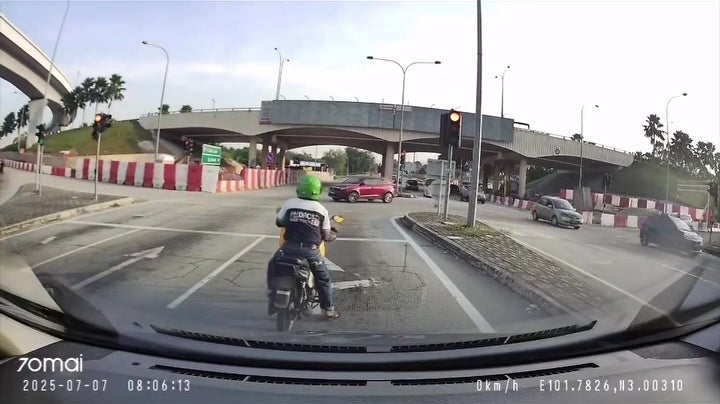 man sit middle of road rest smoke 1 1