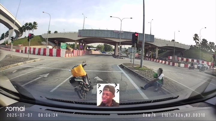man sit middle of road rest smoke 6 1