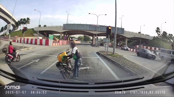 man sit middle of road rest smoke 8 1