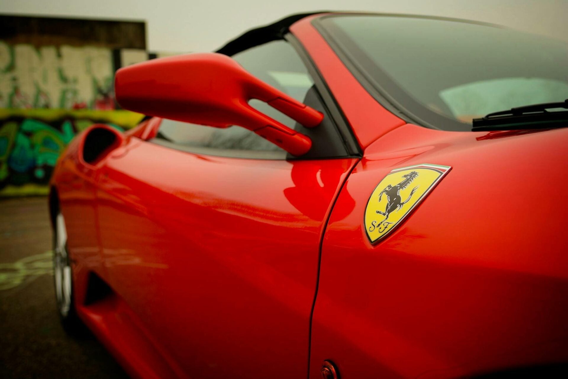 pexels jamil rostum ferrari car logo