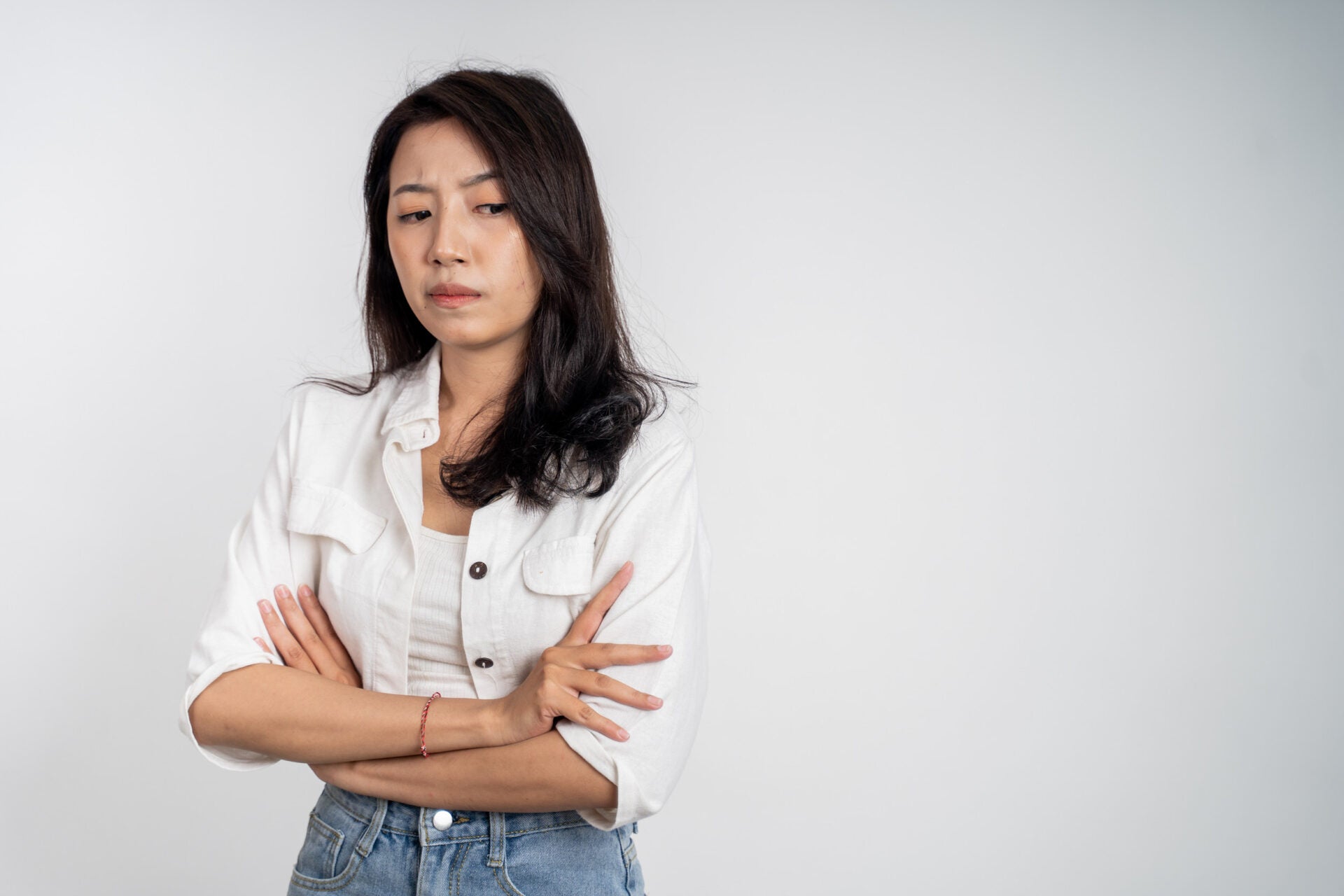 asian woman unhappy cross arms 123rf
