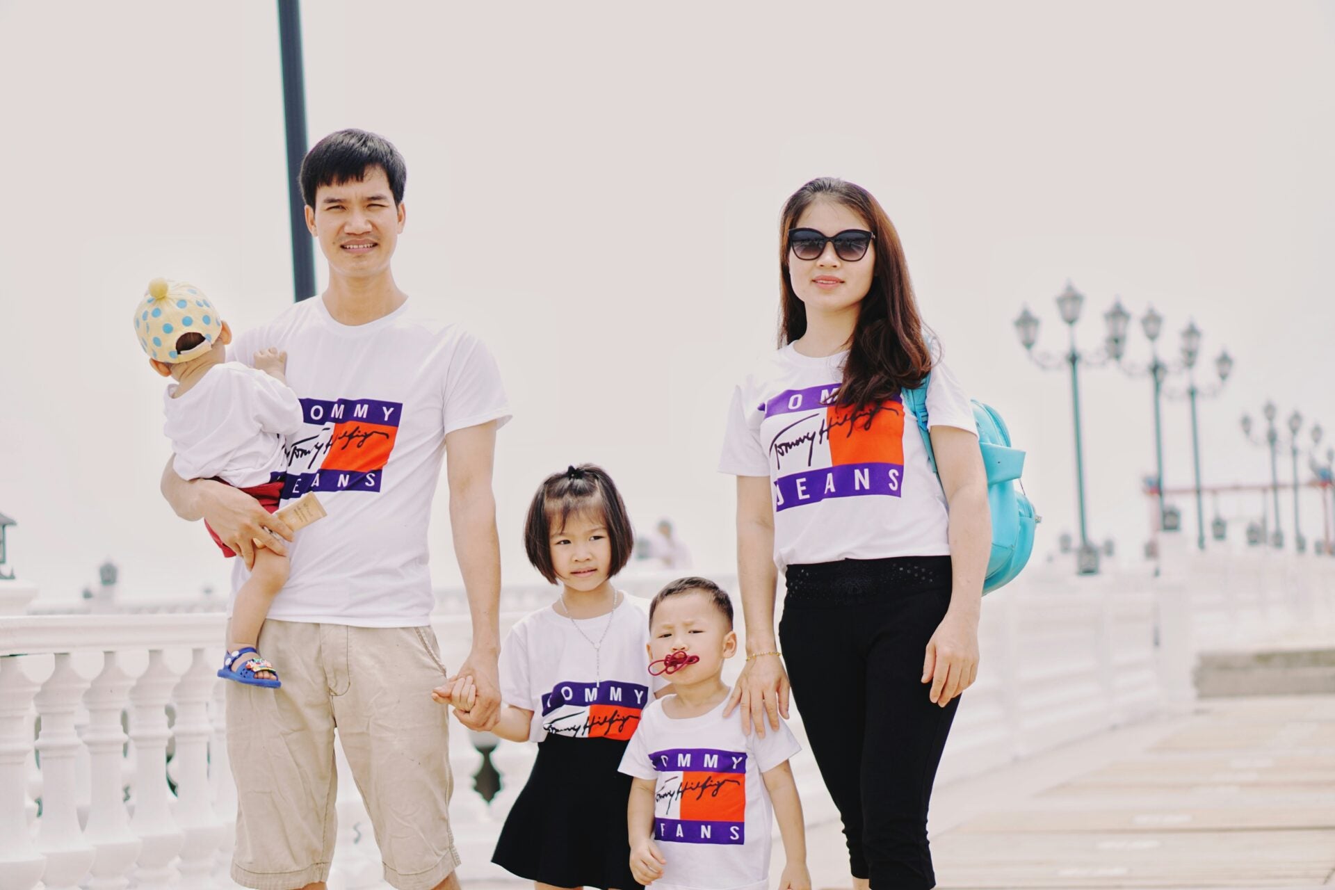 conikal happy family asian 5 members children parents unsplash