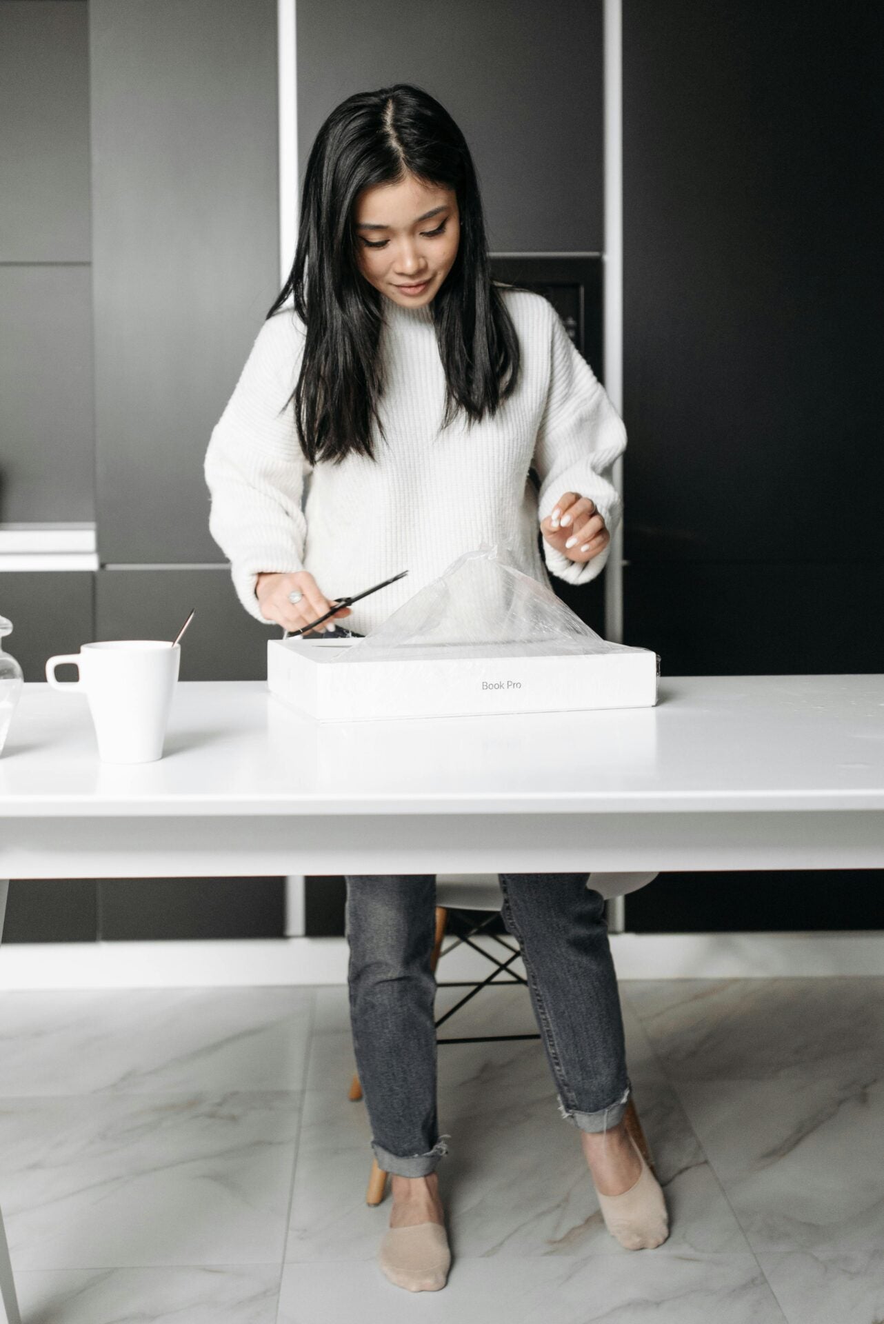 pexels pavel danilyuk macbook unboxing woman