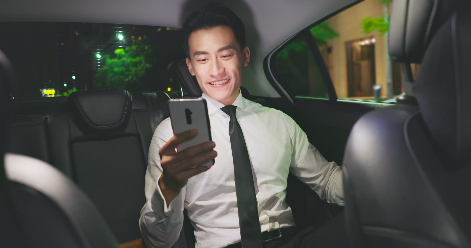 man in taxi e hailing back seat 123rf