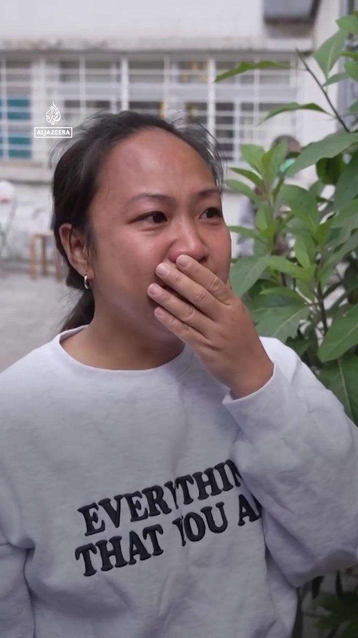 filipino maid hong kong fire 23rd floor carry baby open live safe 1