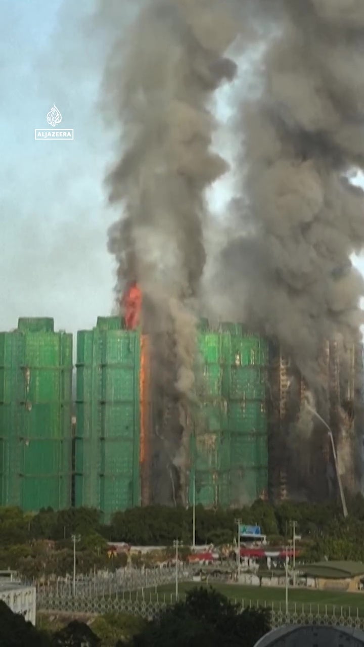 filipino maid hong kong fire 23rd floor carry baby open live safe 6