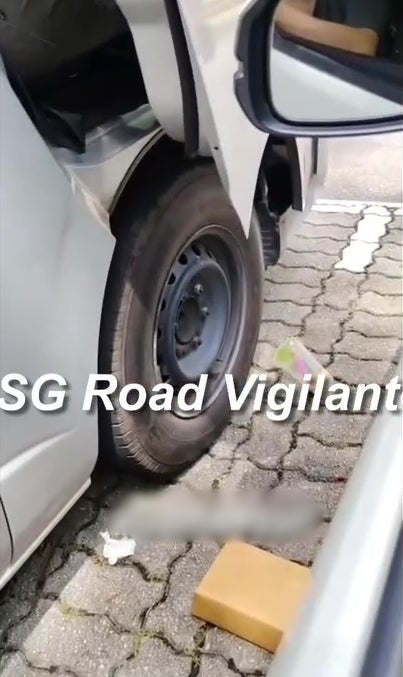 sg driver litter rubbish carpark scold go back malaysia 3