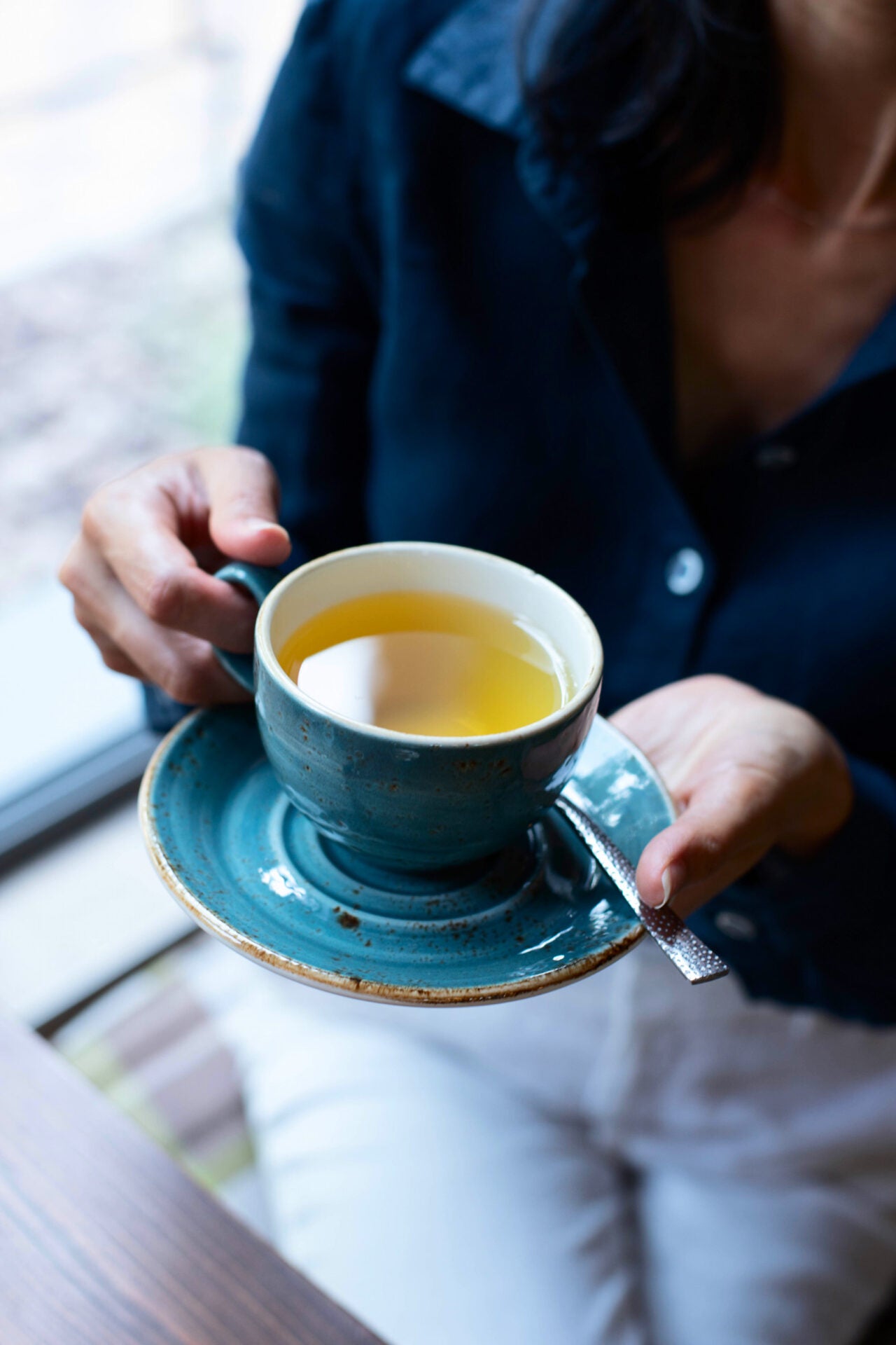 woman drinking hot tea