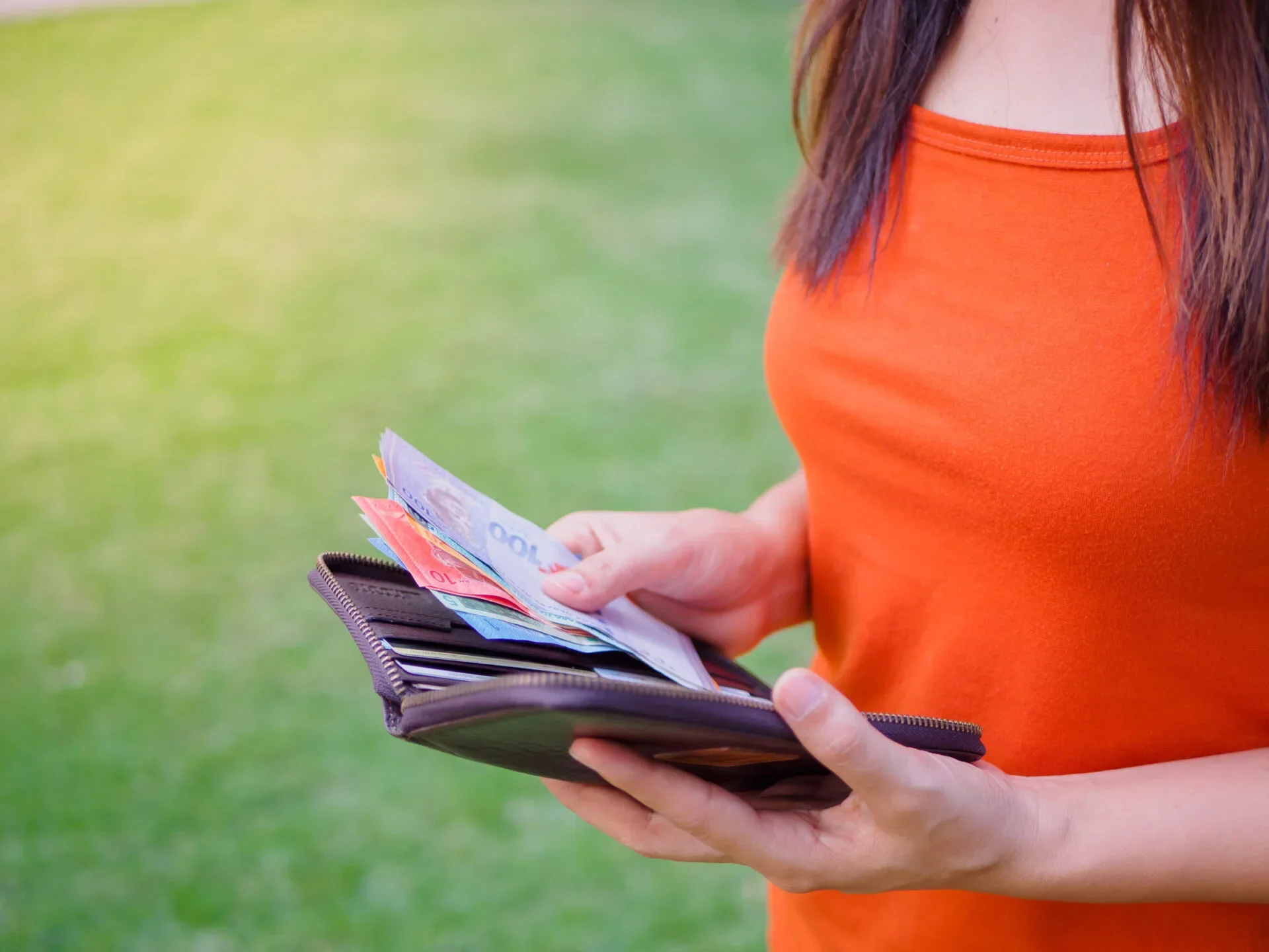 Women Hands Taking Out Money Malaysia Ringgit From Wallet On The Green Grass Field 123Rf
