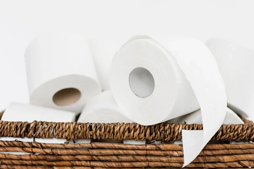 Close Up Backet With Toilet Paper Rolls 23 2148550626