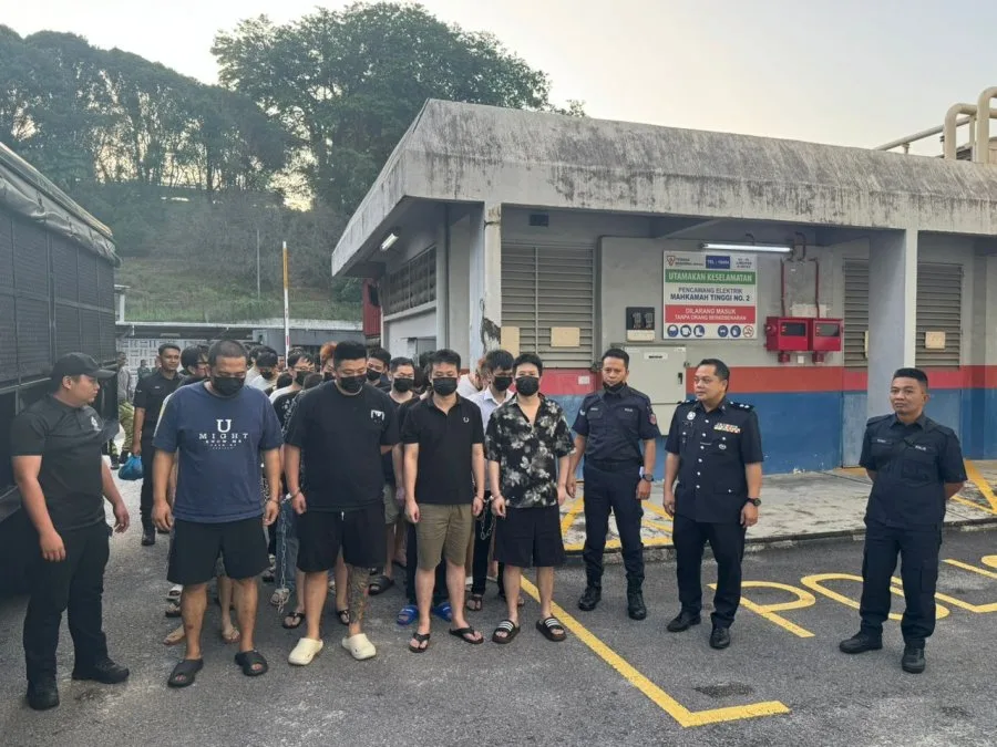 中国籍男子在大马诈骗认罪各被罚Rm3500