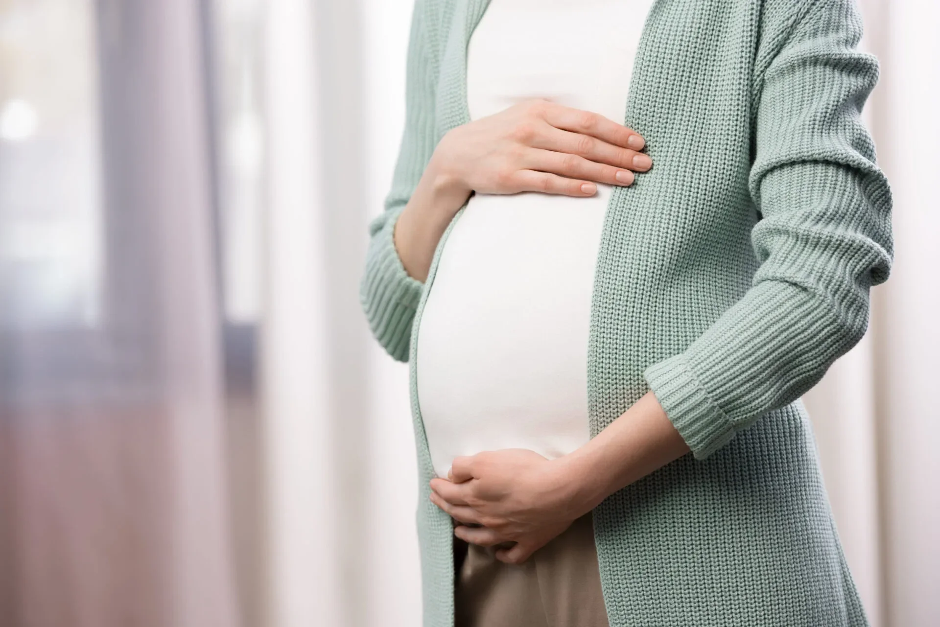 Pregnant Woman Holding Stomach 123Rf
