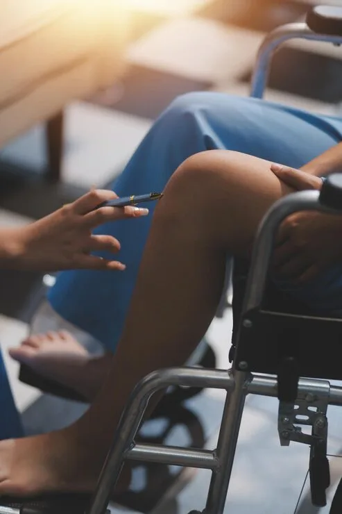 Female Doctor Examines Elderly Patient With Knee Pain Due Arthritis Patient Is Being Assisted Recovery Focusing Pain Management Improving Mobility 265022 120154