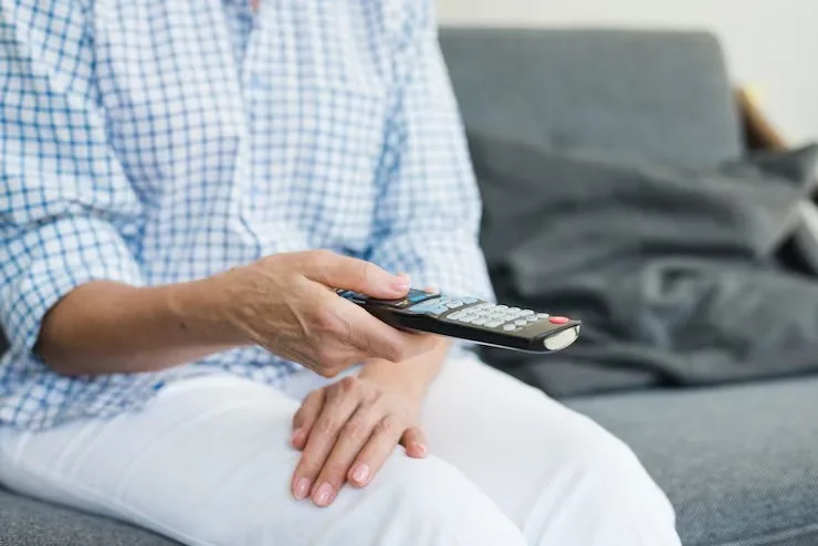 Senior Woman Holding Using Tv Controller Magnific