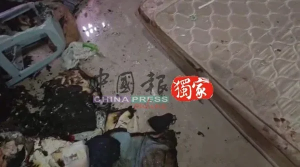 中国男子闯大马排屋倒食油纵火刺伤姐弟 3