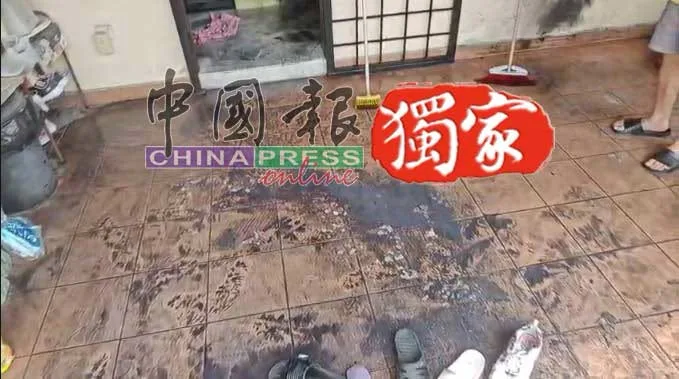 中国男子闯大马排屋倒食油纵火刺伤姐弟 5