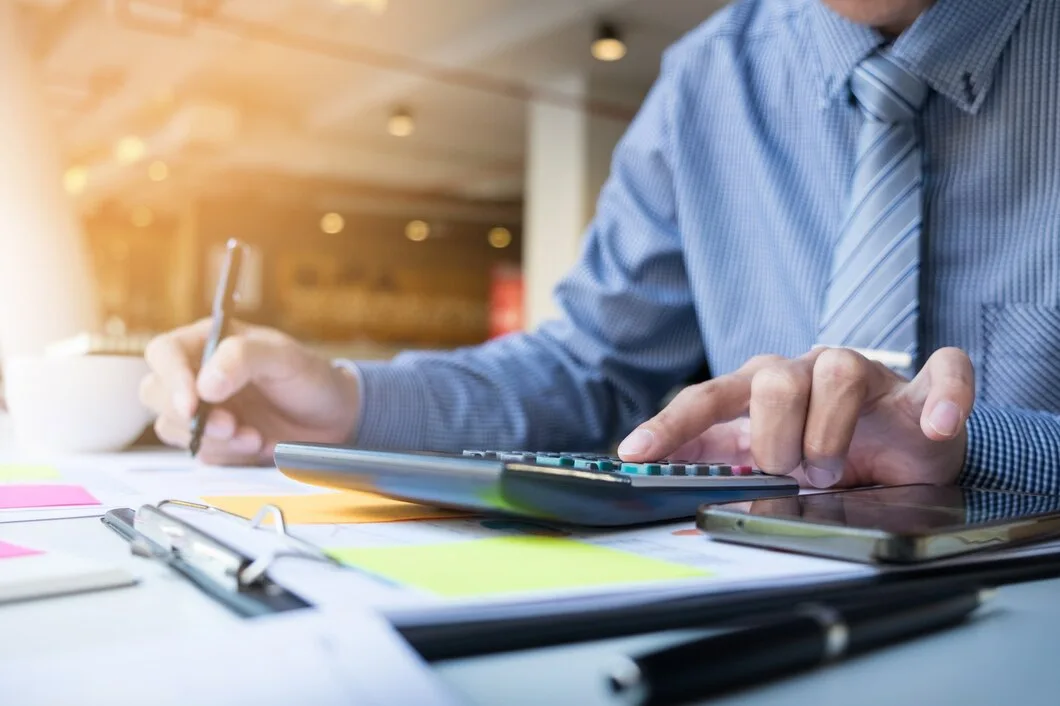 Business Finance Man Calculating Budget Numbers Invoices Financial Adviser Working 1423 119 1