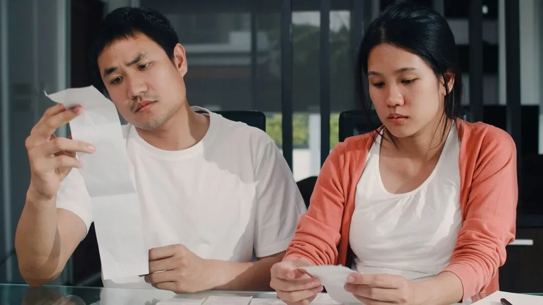 Young Asian Pregnant Couple Records Income Expenses Home Dad Worried Serious Stress While Record Budget Tax Financial Document Working Living Room Home 7861 2203 1